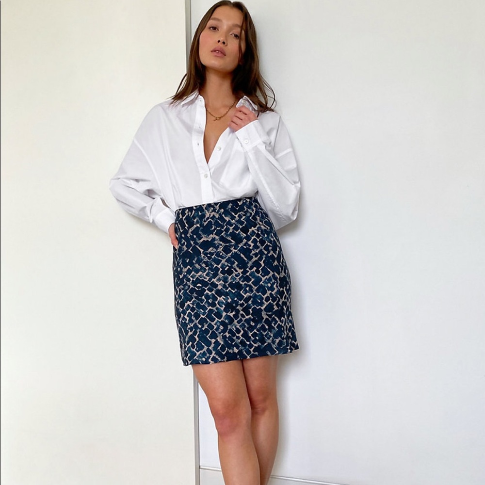 Aritzia / Babaton mini slip skirt in azure blue.